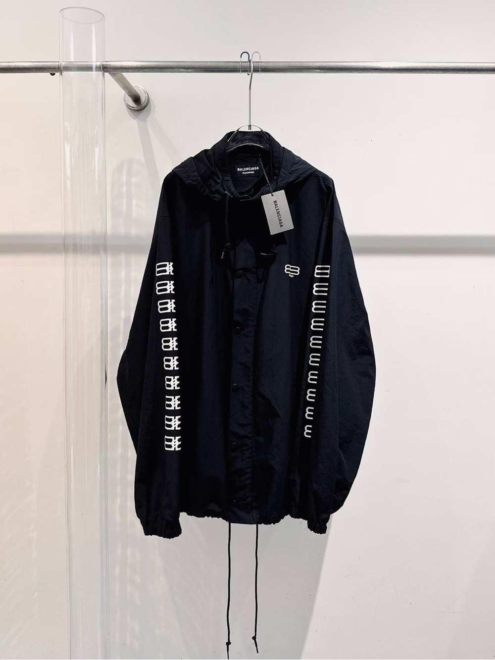 Balenciaga Black Hooded Windbreaker with White Sleeve Logos